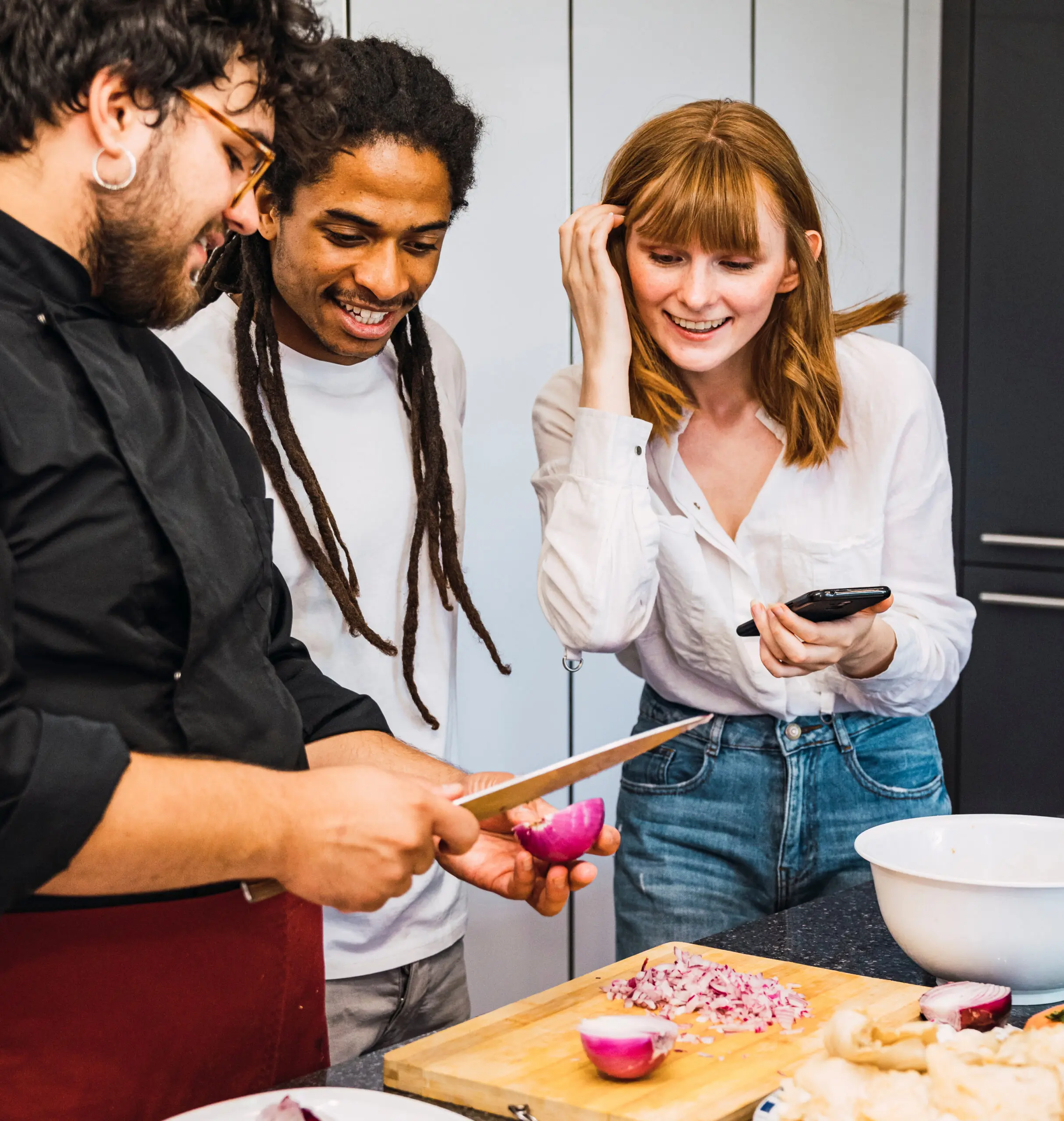A group of individuals cooking.